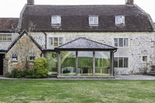 single storey oak frame hipped roof extension