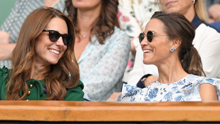 Catherine, Duchess of Cambridge and Pippa Middleton in the Royal Box on Centre Court during day twelve of the Wimbledon Tennis Championships at All England Lawn Tennis and Croquet Club on July 13, 2019 in London, England
