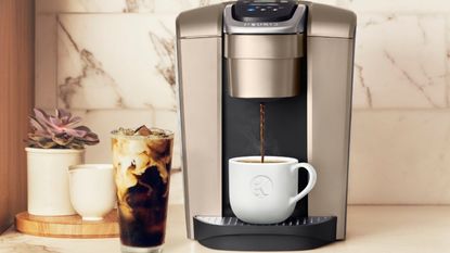 One of the best Keurig coffee makers, the Keurig K-Elite on a countertop making iced and hot coffee