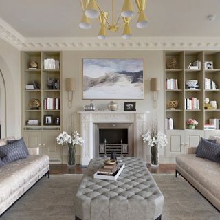 white living room with sofa set and oak parquet flooring