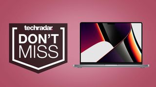 A MacBook Pro 14-inch against a pink background with a TechRadar Don't Miss badge