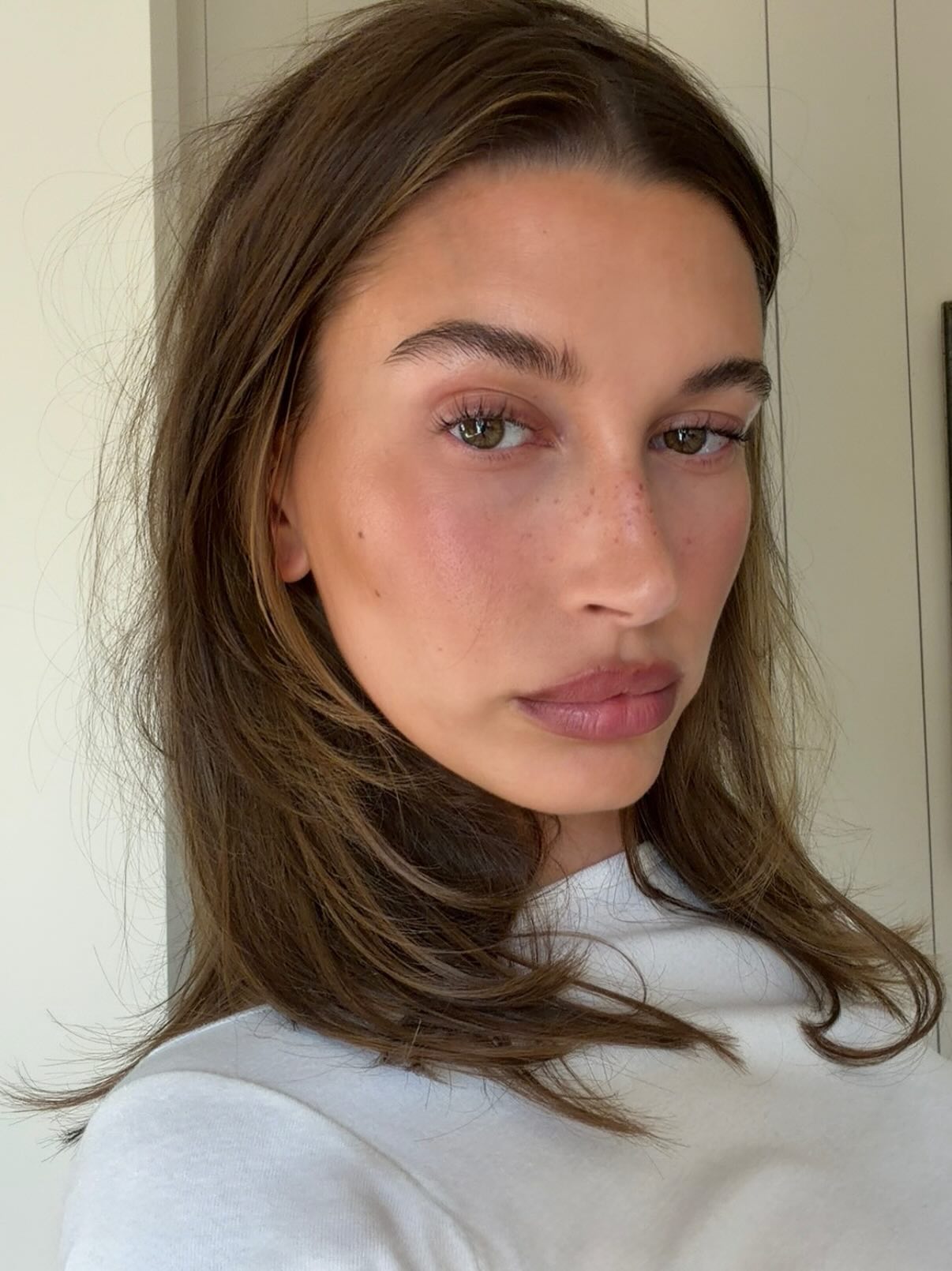 A photo of Hailey Bieber with freckles