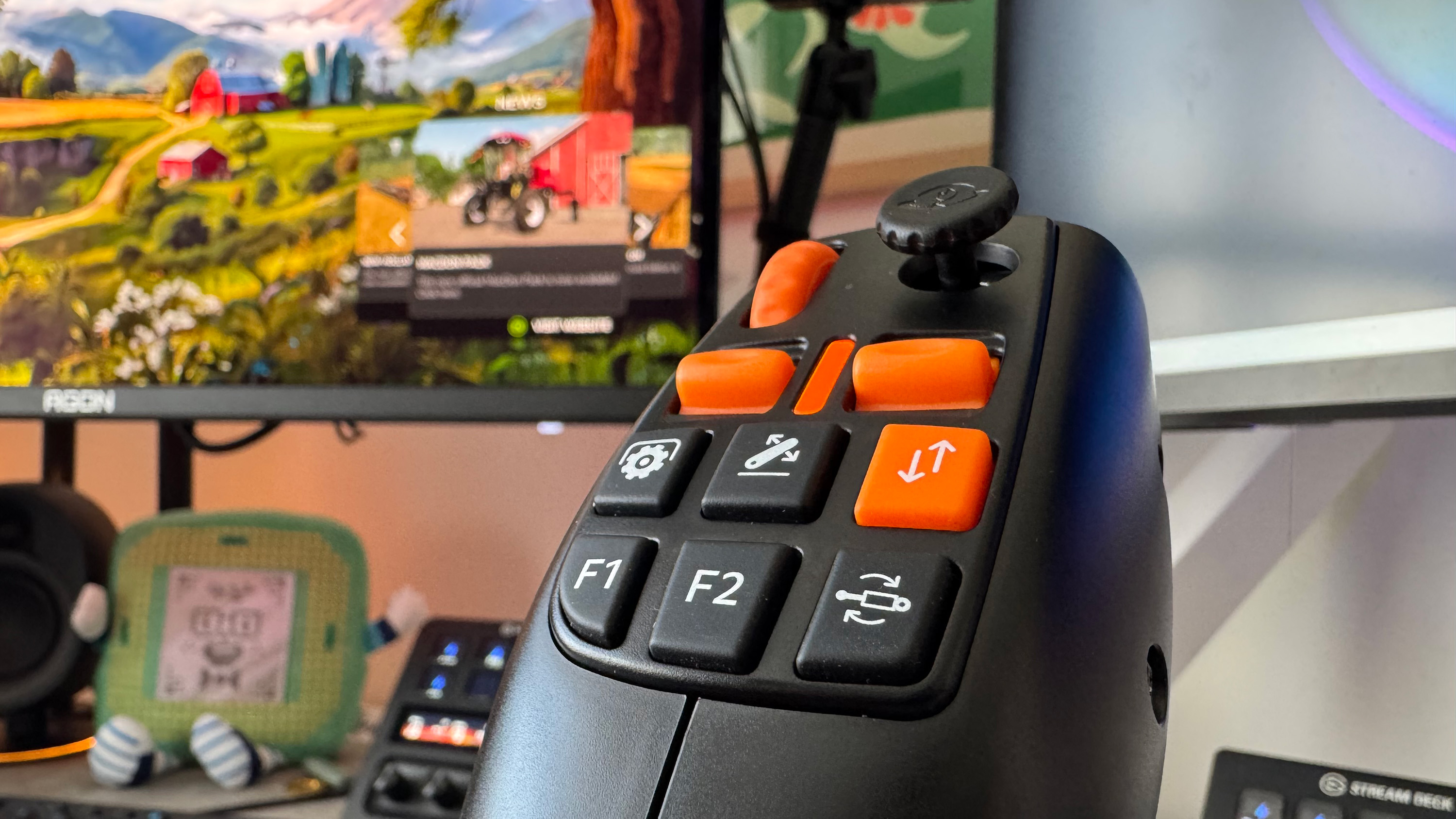 The Thrustmaster SimTask Farmstick on a desk