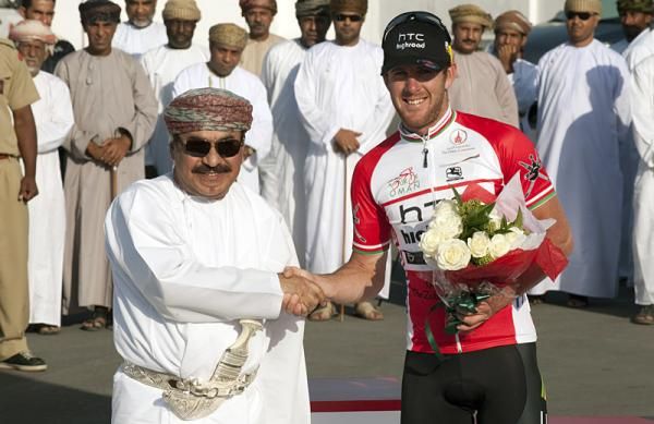 Race leader Matt Goss (HTC - Highroad) receives congratulations.