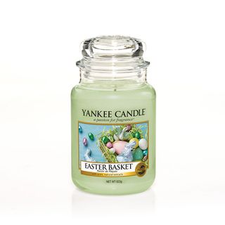 green yankee candle in glass jar