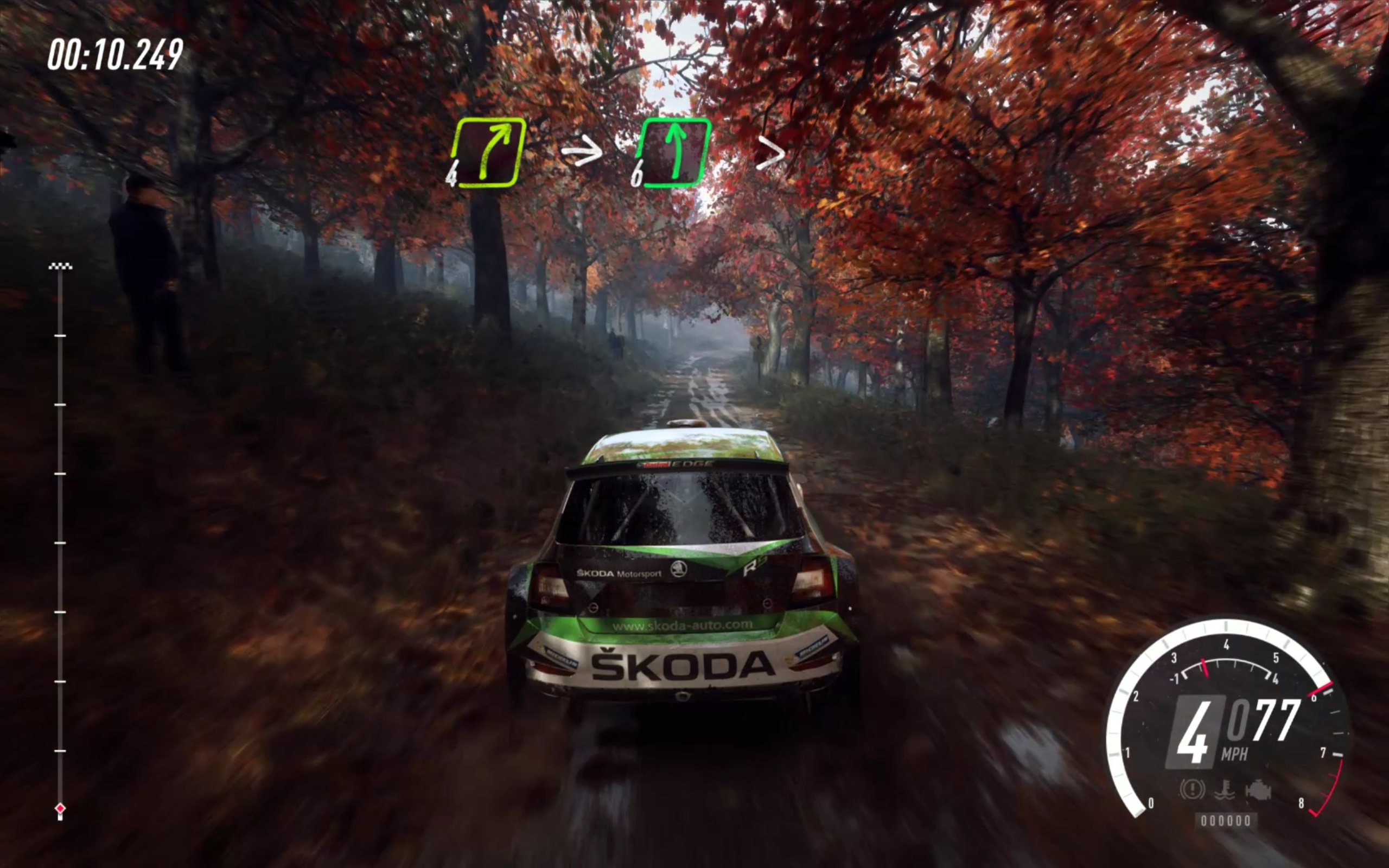 Best racing games - a rally car races in an autumn forest