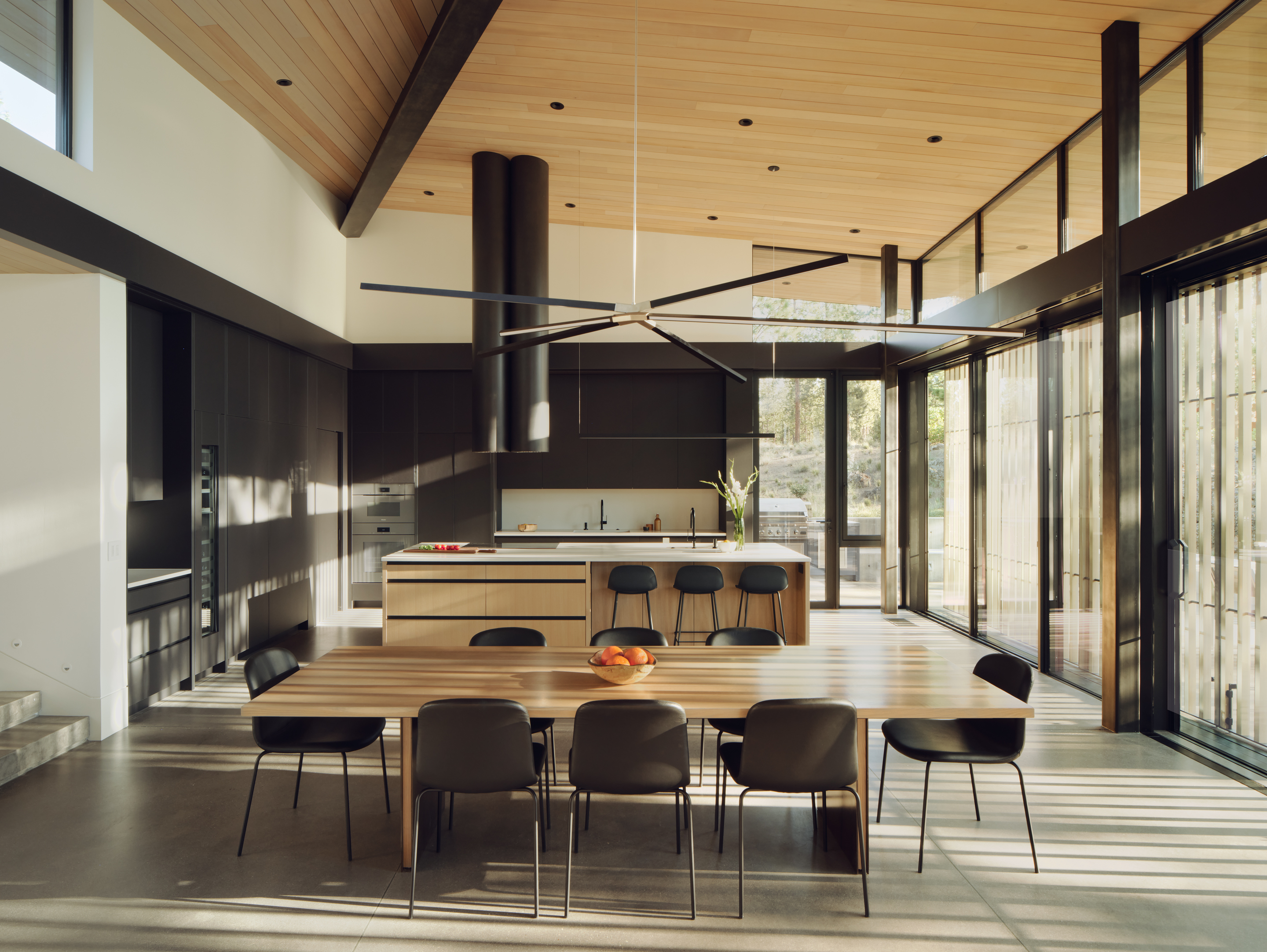 Image of an Oregon house, the Bend Hideaway, a linear modern home among trees and open to nature