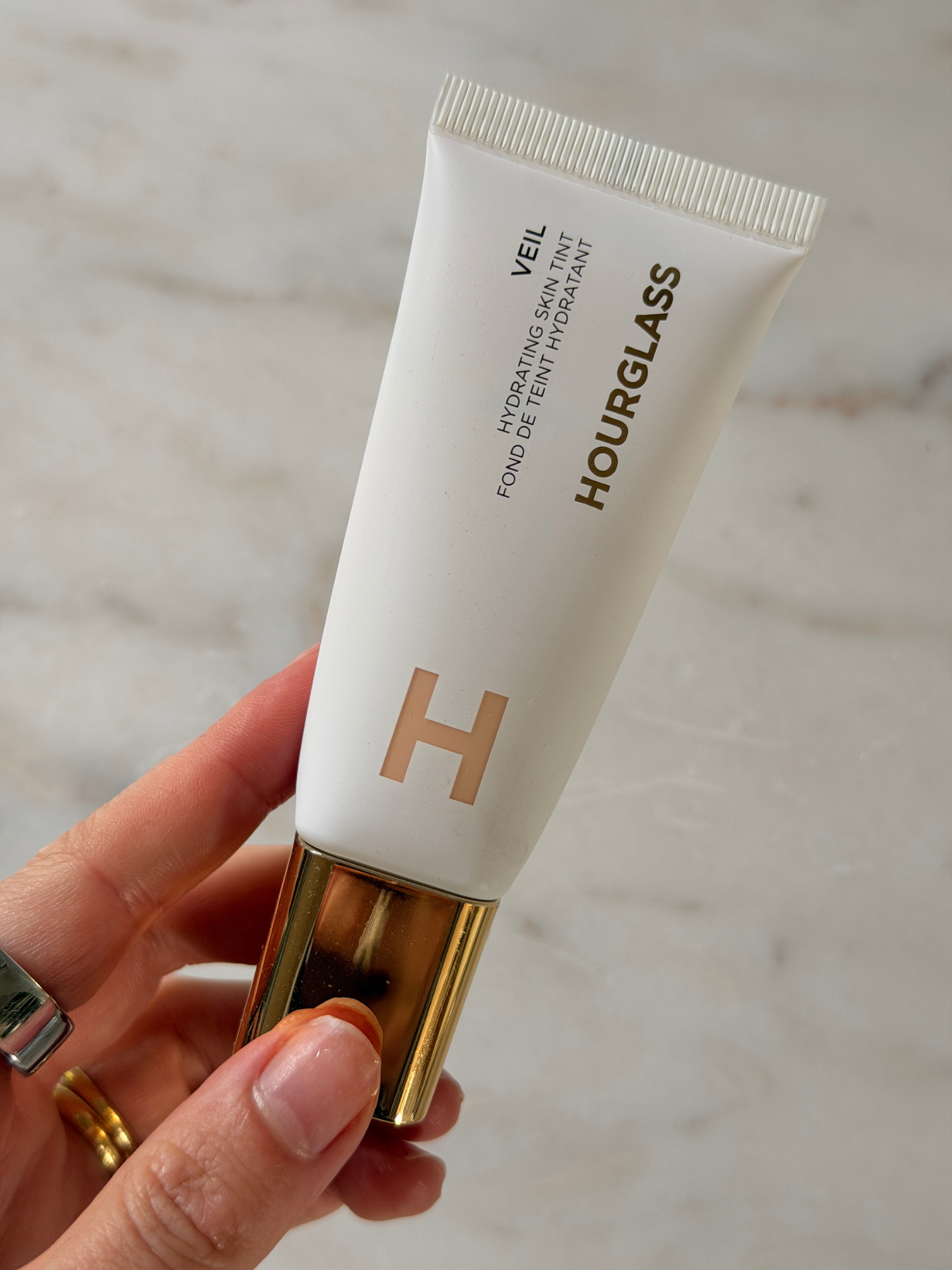Grace Day holding the Hourglass foundation
