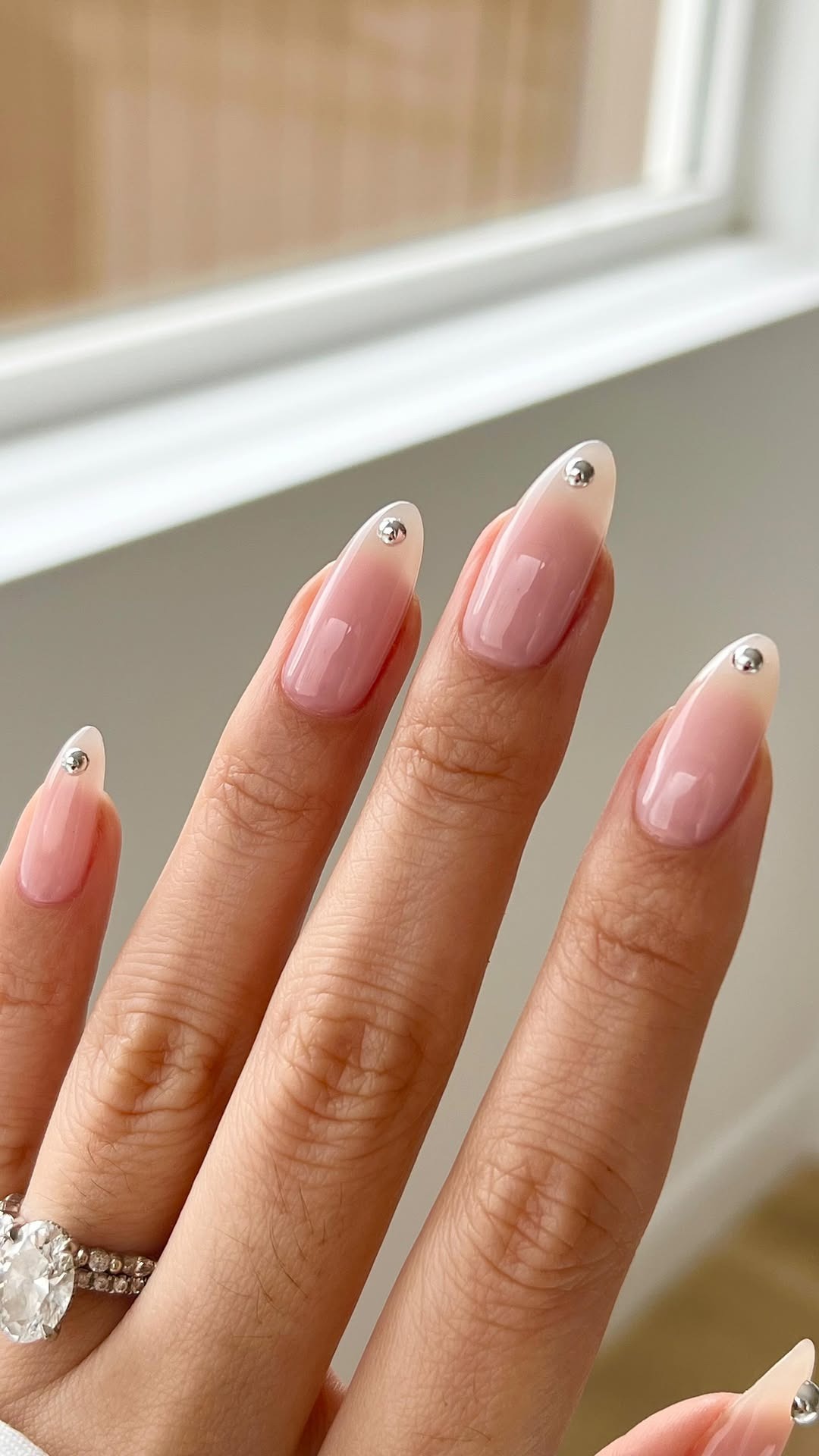 Photo of nails with a pink OPI layering combo