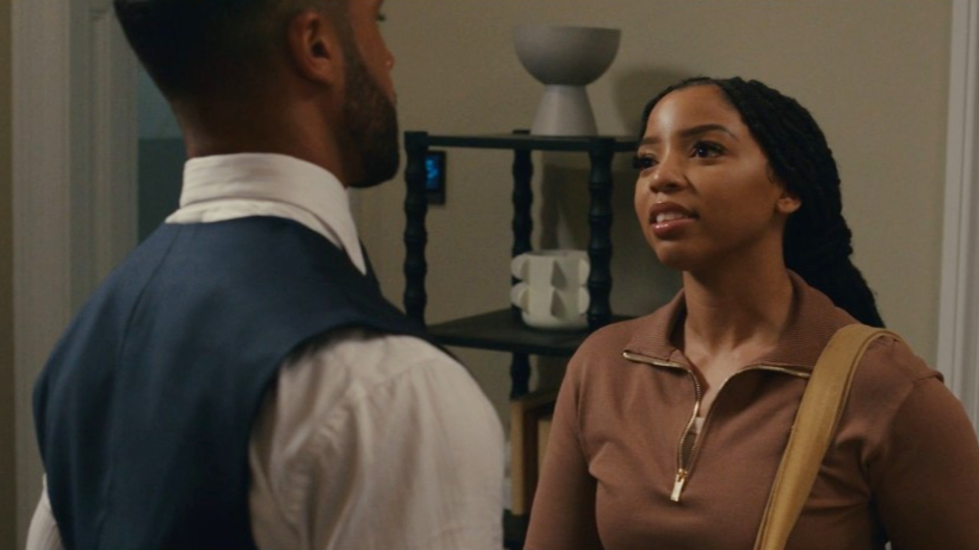 Chloe Bailey talking to Lucien Laviscount in Strung.