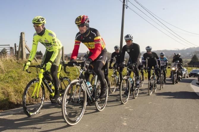 Kevin Hulsmans (Vini Fantini) rides alongside former teammate Tom Boonen (Omega Pharma-Quick Step).