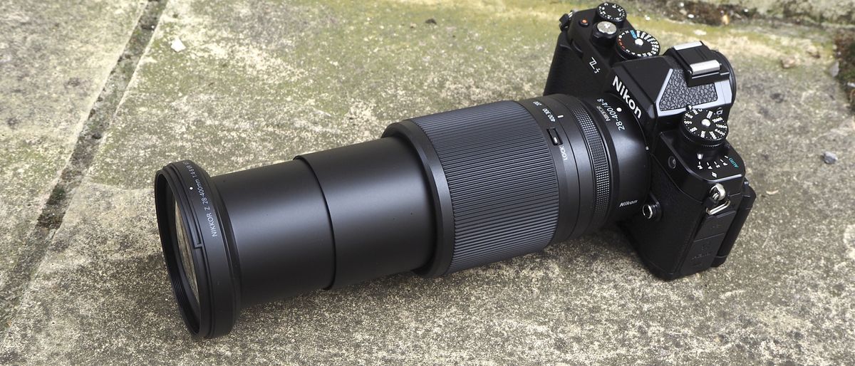 Nikon Z 28-400mm f/4-8 VR lens on concrete surface