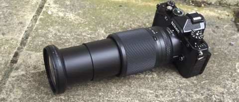 Nikon Z 28-400mm f/4-8 VR lens on concrete surface