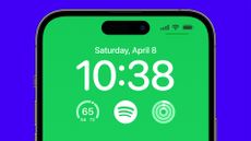 The Spotify home screen widget shown on an iPhone 14 Pro, with a green wallpaper, set against a blue background