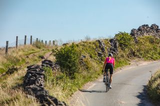 Female cyclist on her longest bike ride of the year