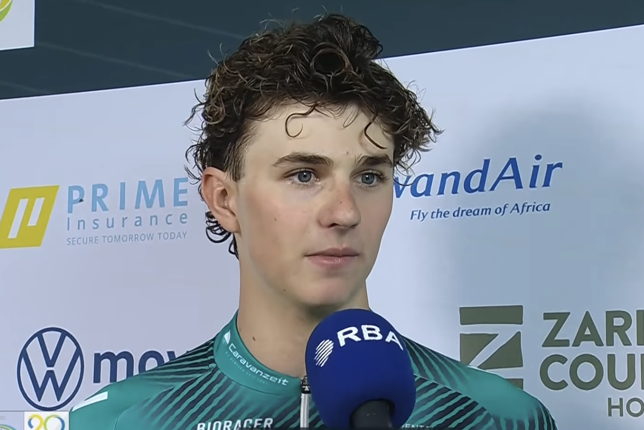 20-year-old Jermaine Zemke of Continental team REMBE Rad-net talks to organisers after winning stage 5 at Tour du Rwanda