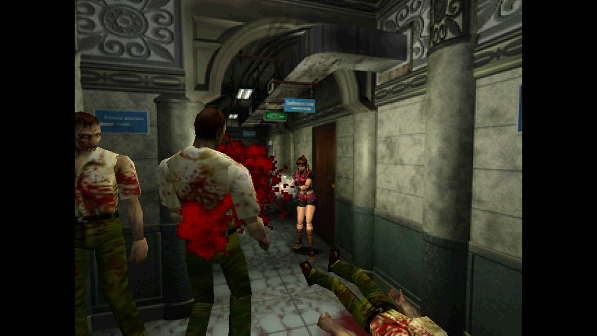 Claire Redfield blasts zombies with a shotgun in Resident Evil 2 for the PC as pixelated blood sprays everywhere
