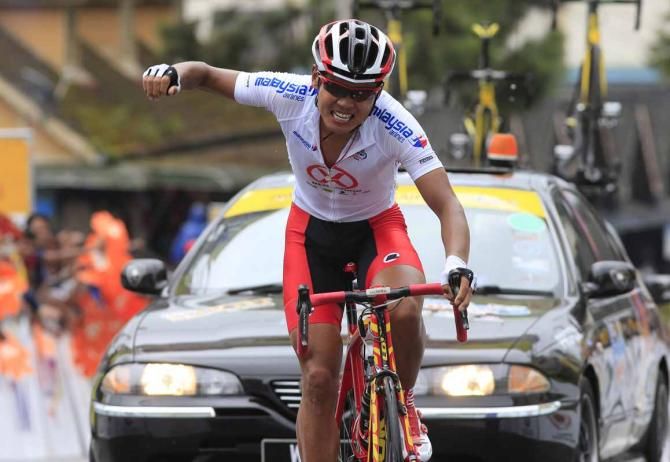 Meiyin Wang (Hengxiang Cycling Team) celebrates his stage victory