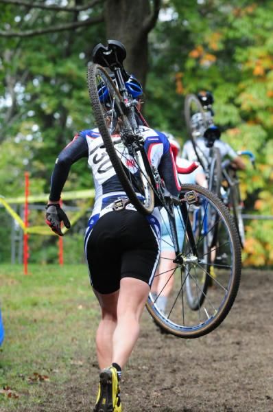 Rebecca Wellons (Team Plan C) running uphill.