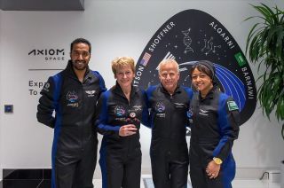 Ax-2 commander Peggy Whitson (second from left) holds GiGi, the Build-A-Bear zero-g indicator, while posing with her crewmates Ali AlQarni (at left), Josh Stoffner and Rayyanah Barnawi.