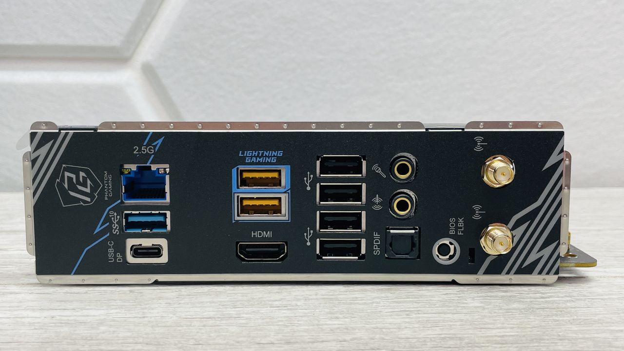 ASRock Phantom Gaming B850I Lightning Wi-Fi motherboard on a desk.