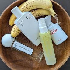 Banana Perfumes in a wooden bowl with bananas