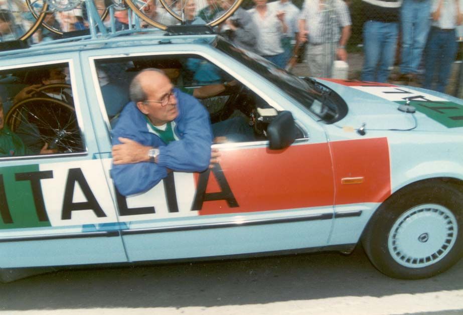 Italian coach Alfredo Martini watches on in the car
