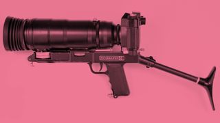 The side of the Zenit Fotosniper camera on a pink background