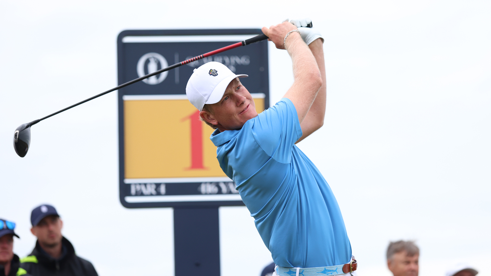 Luke Poulter hits a driver off the tee
