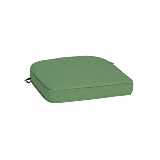 A green outdoor cushion