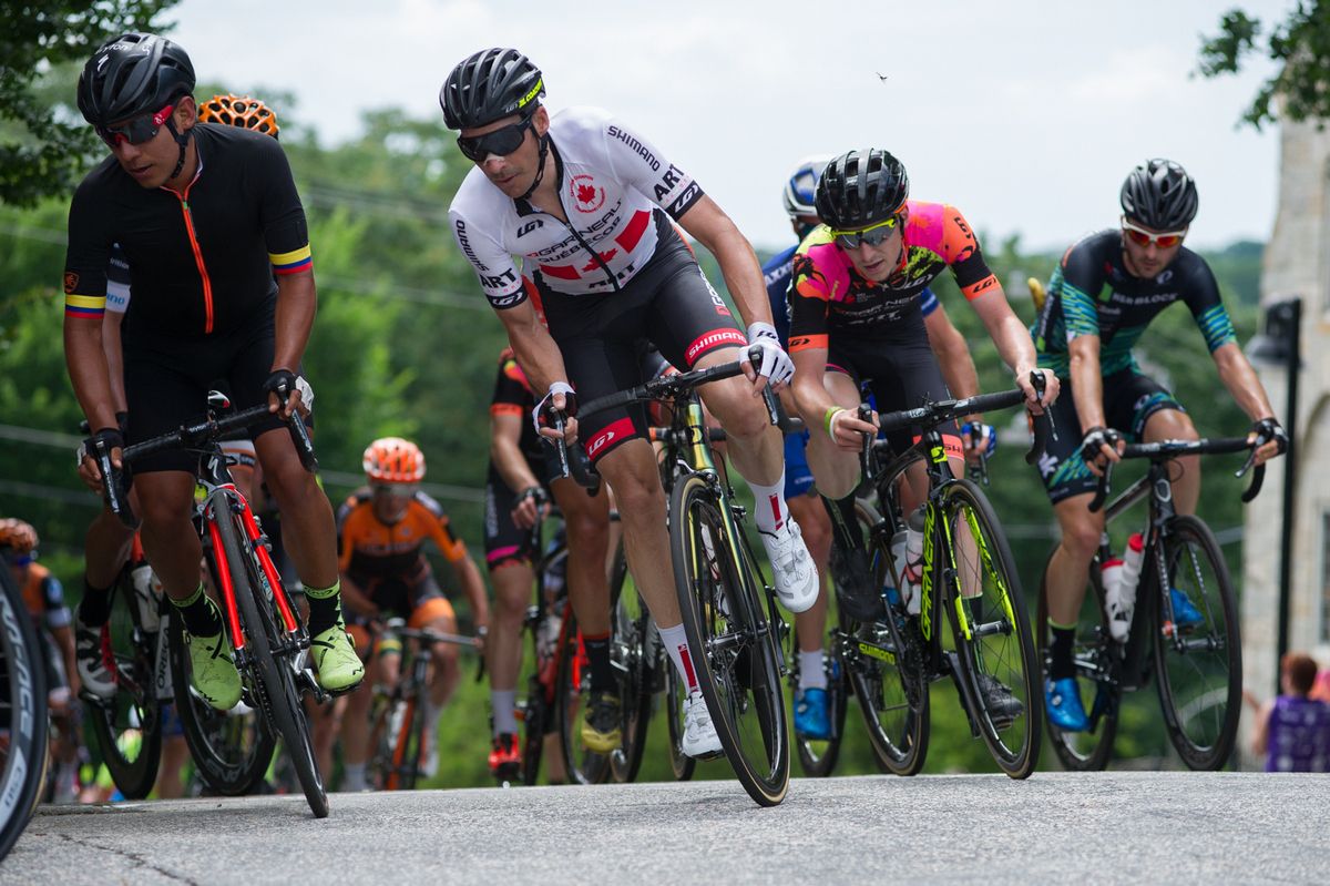 Riders hit the turn at the top of the climb