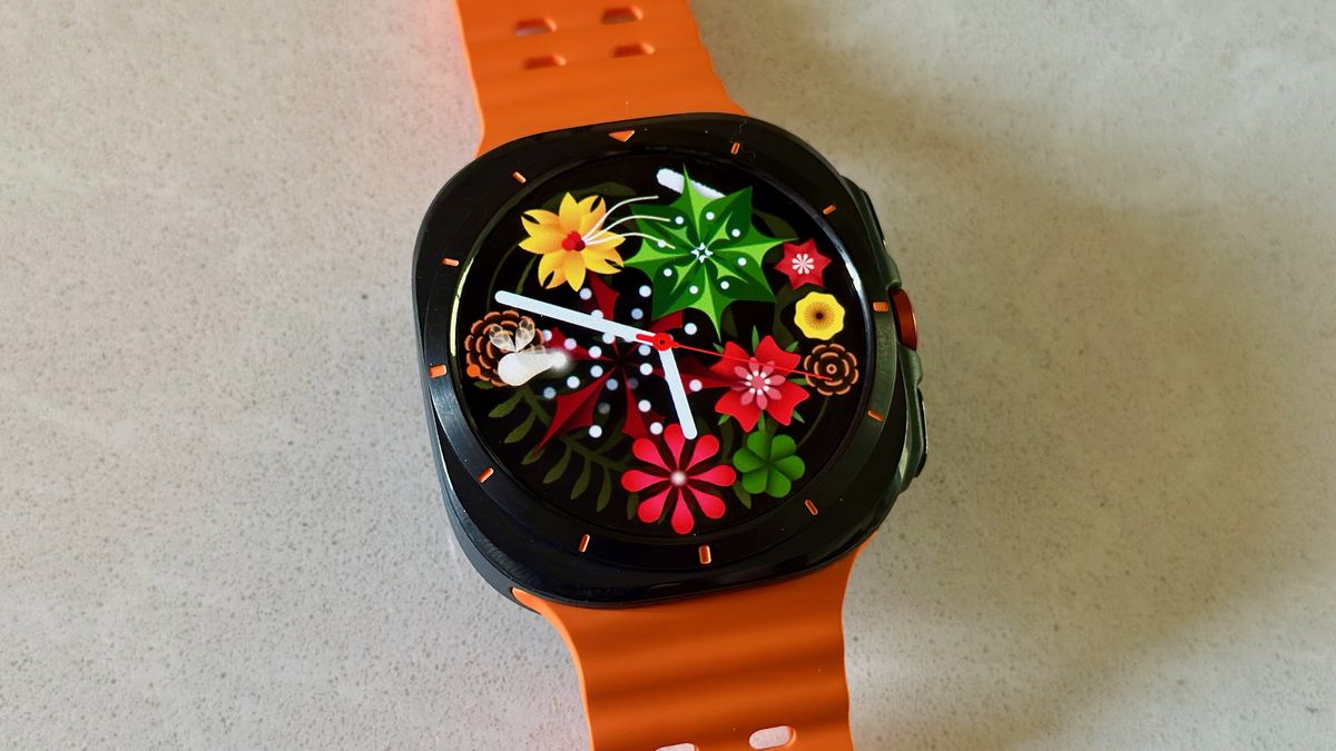 The Samsung Galaxy Watch Ultra sitting on a white counter, showing the Flower Garden watch face.