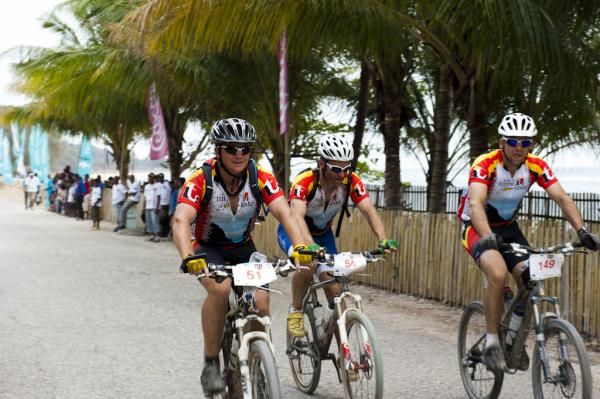Three teammates roll in to the finish on day 4