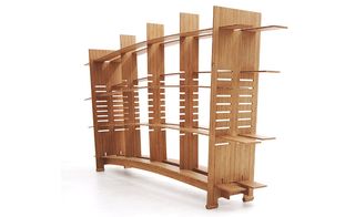 Slightly arched free standing shelving unit