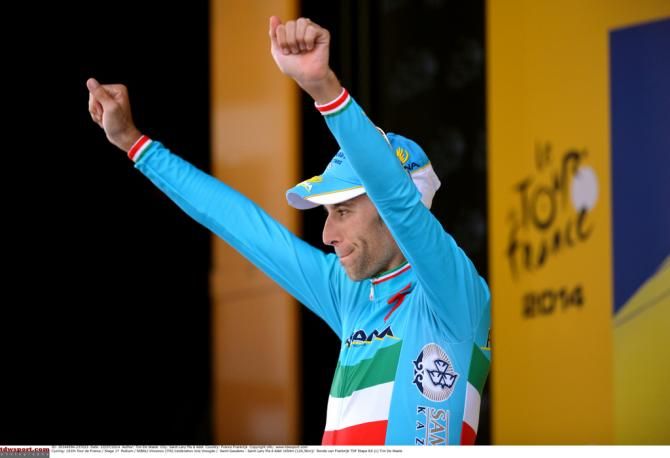 Vincenzo Nibali (Astana) about to collect another yellow jersey and lion combo