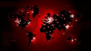 Global map in black and red colour scheme denoting threat with plots in major cities to show cyber attacks being observed across the world