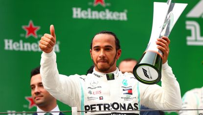 Mercedes driver Lewis Hamilton won Formula 1’s landmark 1,000th world championship race