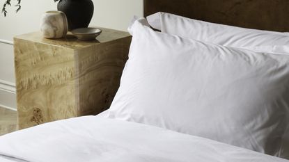 white company bedding on a bed