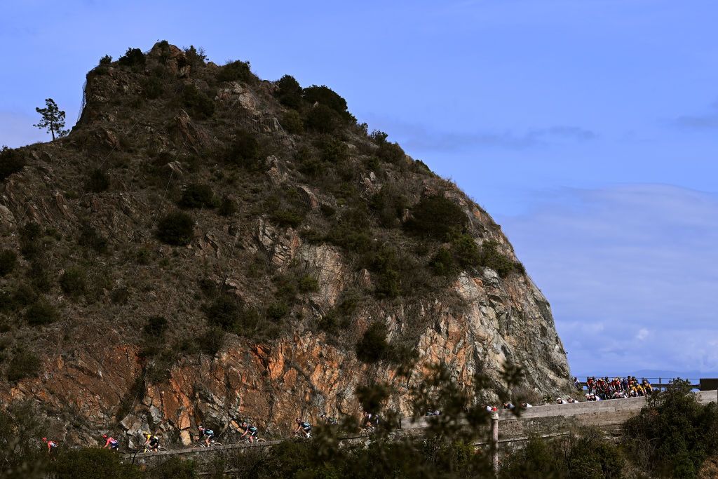 SANREMO ITALY MARCH 18 A general view of the peloton passing through a landscape during the 114th MilanoSanremo 2023 a 294km one day race from Abbiategrasso to Sanremo MilanoSanremo UCIWT on March 18 2023 in Sanremo Italy Photo by Tim de WaeleGetty Images
