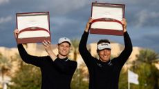 Bernhard Langer of Germany and son, Jason Langer, celebrate winning the PNC Championship at The Ritz-Carlton Golf Club 