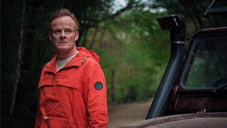 Rob (Alistair Petrie) in an orange jumpsuit in The Following Events Are Based On A Pack Of Lies