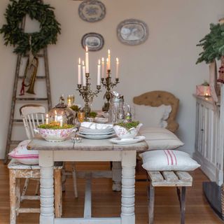 vintage style dining room with silver candelabra decorated for Christmas