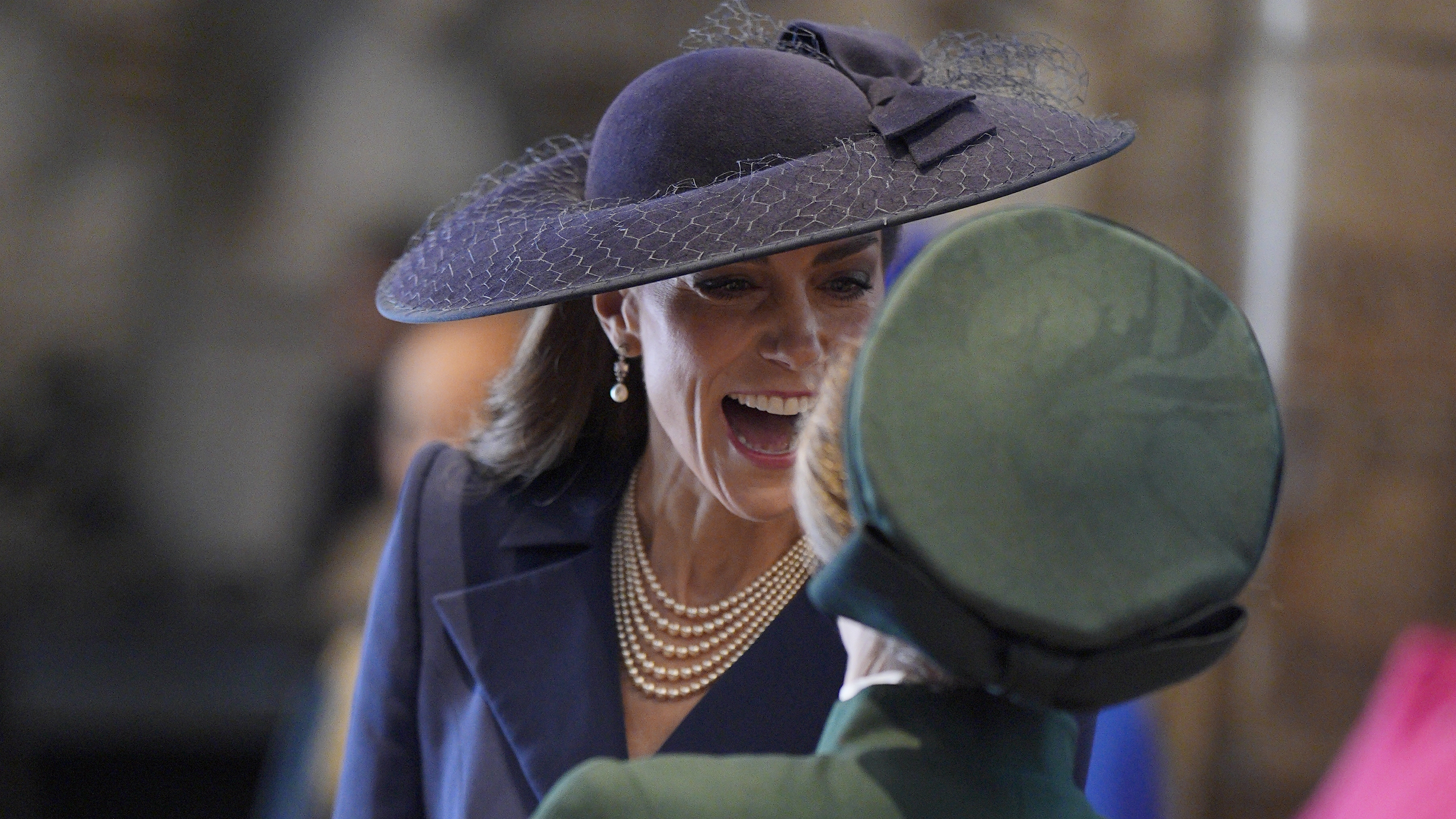 Catherine, Princess of Wales laughs and speaks with Princess Anne, Princess Royal during the 2026 Commonwealth Day Service
