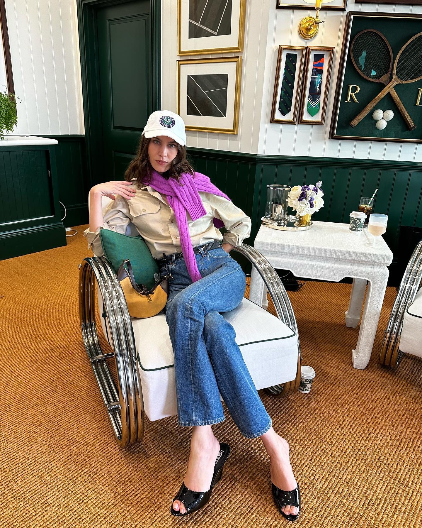 Influencer wears a wedge mule.
