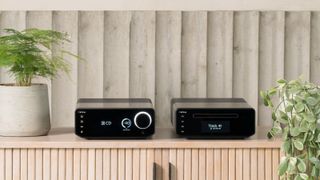 The Cyrus 40 Series Amp and CD player side by side on a sideboard.