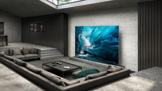 A sleek, modern living room space featuring a massive Samsung Neo QLED 2022 TV