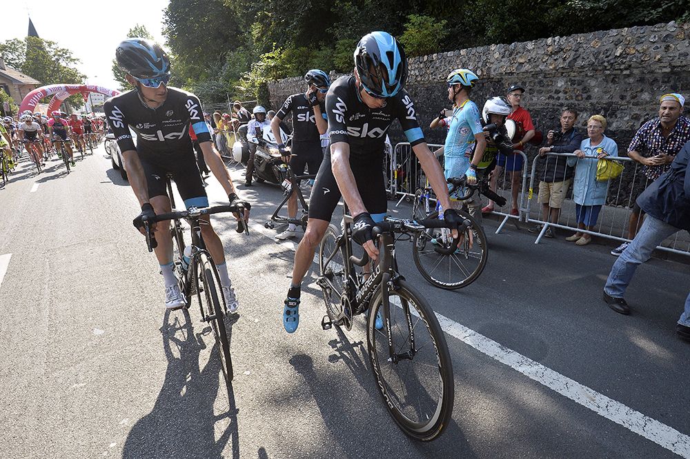 Chris Froome (Sky) avoided the crash but needed a wheel change