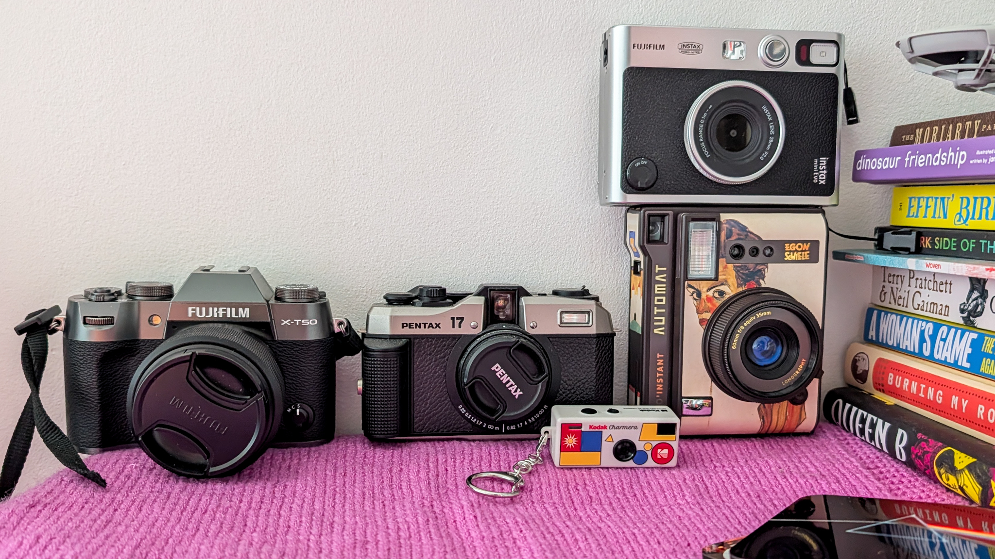 A photo of a Kodak Charmera keychain camera