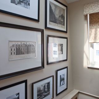 hallway wall with picture frames