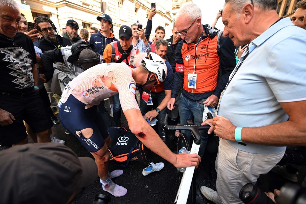 Netherlands Mathieu van der Poel with ripped jersey and bloody elbow after winning the elite men&rsquo;s road race